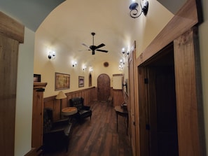 Entry foyer long view highlighting round ceilings throughout
