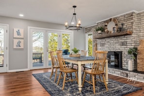 Dining room with lake view and deck access