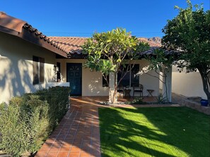 Front of house with mature fruit trees to enjoy