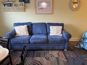This comfortable couch turns into a comfortable pull out bed.