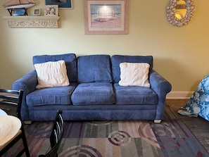 This comfortable couch turns into a comfortable pull out bed.