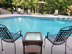 Our pool is so close that it is visible from the front walk. 