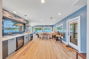 Entry foyer, wet bar with ice maker and 2 refrigerators