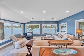 3 sided sun room overlooking the lake