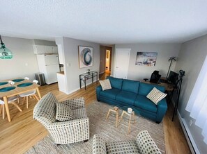 Living room + dedicated workspace