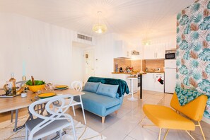 The living room and the kitchen area