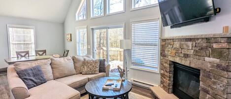 Welcome to the Woodland Chalet! Big, Beautiful and Bright Living Room, Two Living Spaces, Elevated Deck and Community Amenities. There's a lot to love!