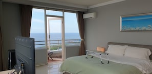 master bedroom with 2 balcony access 