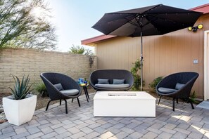 Patio seating for 8 with gas firepit to keep cozy while enjoying the outdoors!