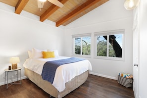 Private bedroom with a queen bed