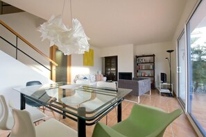 Dining area. Living and dining room with fireplace