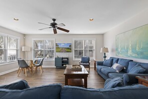 Our living room with a smart TV and ocean views is the perfect spot to unwind.