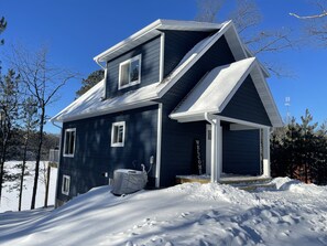 Outside view of the cabin facing the Lake, plenty of parking for cars and toys