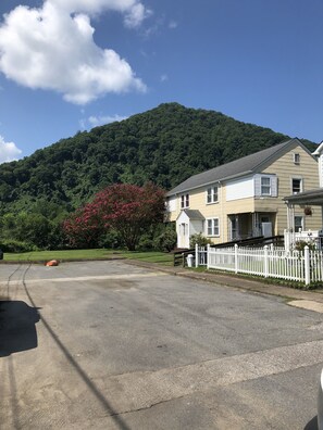 Parking in front of the apartment allows for one spot per unit. Others park road