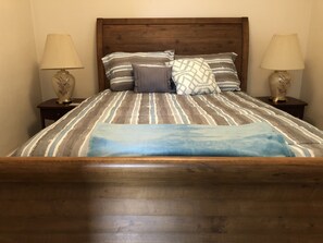 This is a very comfortable bed and there is a ceiling fan not pictured also.