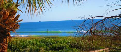 Easy walk from the condo to the beach, a few steps to the private beach access.