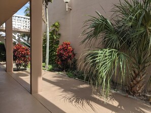 The condo is a quiet corner unit with a little patio.