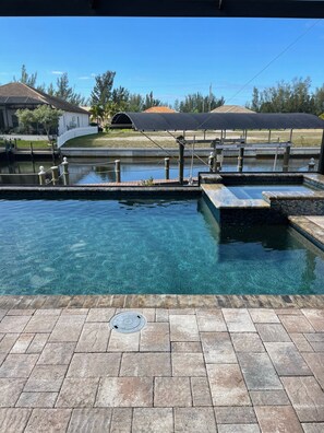 Beautiful saltwater pool and jacuzzi with sunset west-facing views