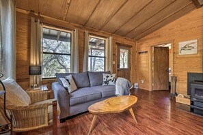 Cozy living area with a potbelly stove for cold winter nights.