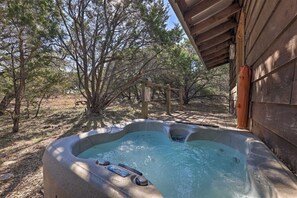 Unwind in the private hot tub under the stars