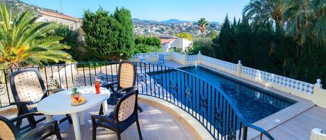 Sky, Water, Furniture, Building, Azure, Tree, Swimming Pool, Outdoor Furniture, Chair, Plant