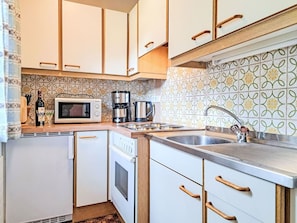 Kitchen, Countertop, Flooring, Plumbing Fixture, Major Appliance, Sink, Interior Design, Tap, Floor, Kitchen Appliance