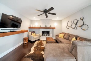 Sectional Sofa, 2 chairs, decorative fireplace & 42" Smart TV