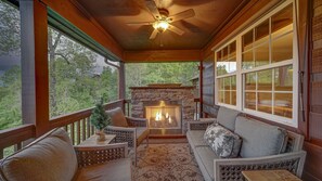 Main level deck with cozy fireplace