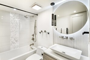 Bathroom featuring heated floors and towel rack