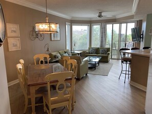 Living area with dining table for six