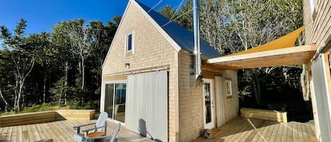 Two cabins (one living rm./kitchen, other bedrm. /bathroom ) surrounded by decks