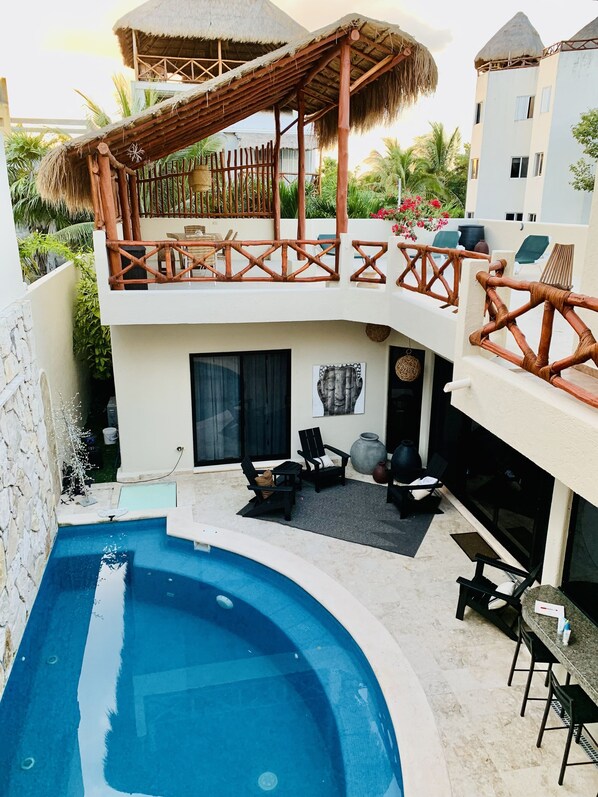 View looking down from 2nd story condo into courtyard.