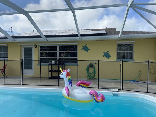 Caged lanai with heated pool