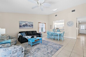 Living room with pull out sofa bed and Roku TV