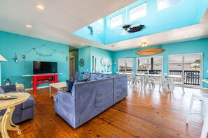 Upstairs living/dining room is spacious and colorful
