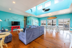 Upstairs living/dining room is spacious and colorful