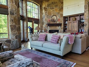 Cozy living room with stone walls