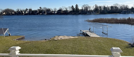 Lots of yard between the house & sea wall.   Sandy beach for the kids 