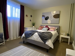Bedroom with comfortable Queen bed