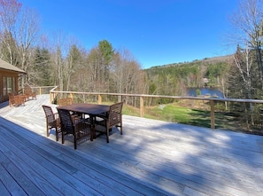 Relax on the expansive deck with breathtaking water views.