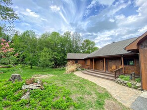 This newly renovated, Burns Pond home blends rustic charm with modern comforts.