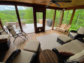 For those warm summer nights, the enclosed three-season porch lets you soak in the surroundings without any pesky bugs.