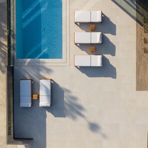 Sophisticated pool surroundings offering a sense of tranquility. 