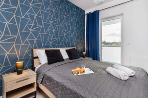 Comfortable double bed in the bedroom. 