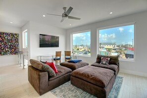 Living room - Light filled living room with chaise loungers