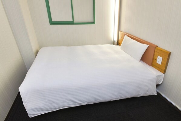 Enjoy a comfortable sleep in our functional rooms.