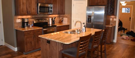 Kitchen with granite counters and spacious island