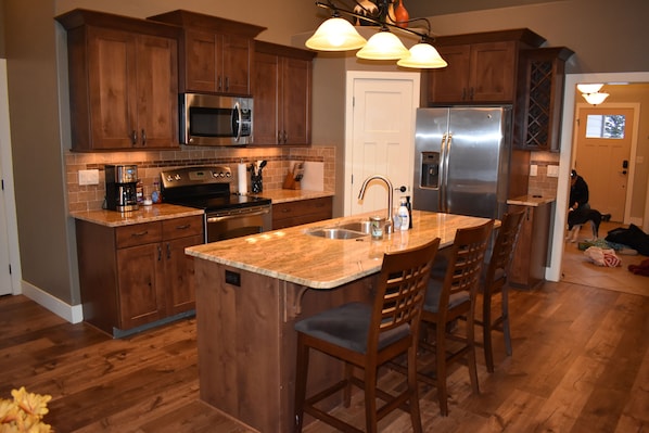 Kitchen with granite counters and spacious island