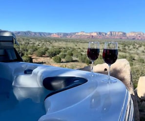 Bubbly Bliss: Hot Tub Heaven with Red Rock Views...Whether you're planning a romantic getaway, a girls' trip, or need some serious me-time, this hot tub's got your name on it. Unwind after hiking, shopping, or spa-ing (is that a word? It should be).