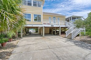 Front of home with large driveway for boat parking 